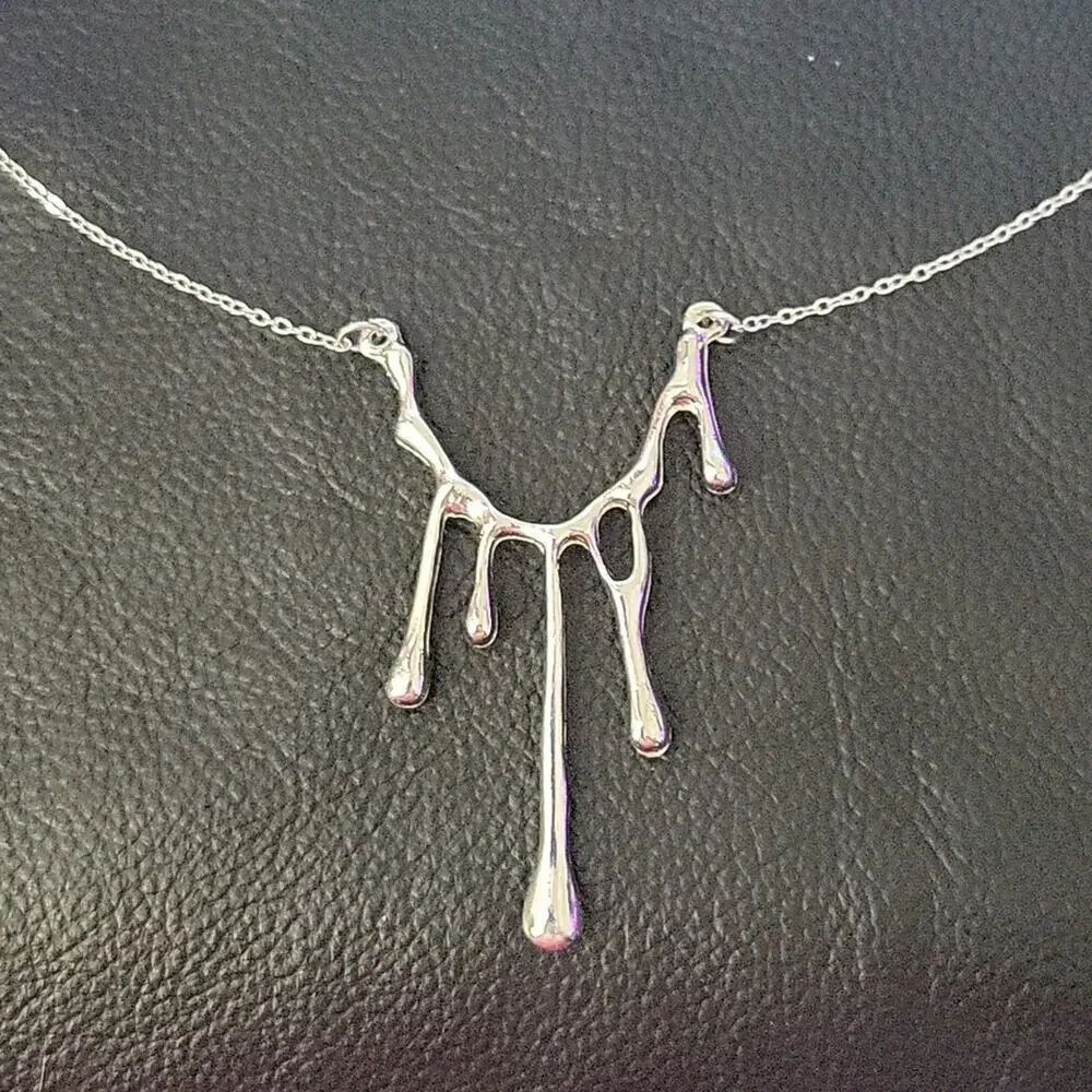 Closet Fairy | Jewelry | Unique Melting Drippy Metal Silver Necklace ...